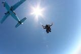 Skydive California jumpers safely enjoying tandem skydiving