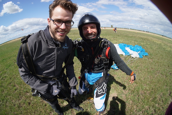 tipping in skydiving Happy Tandem Skydiving Instructor with Student