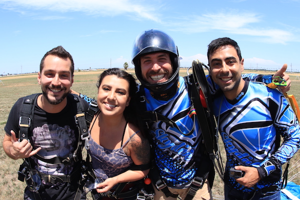 Tandem Skydiving Students and Instructors after landing