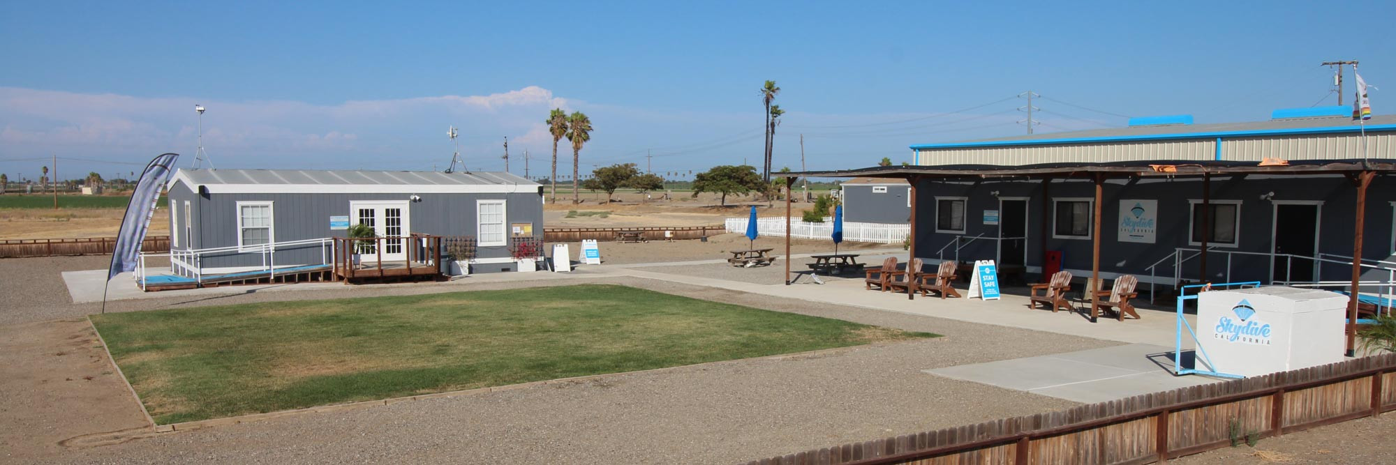 Courtyard view of Skydive California showcasing multiple buildings including the hangar, a prime Northern California film location.