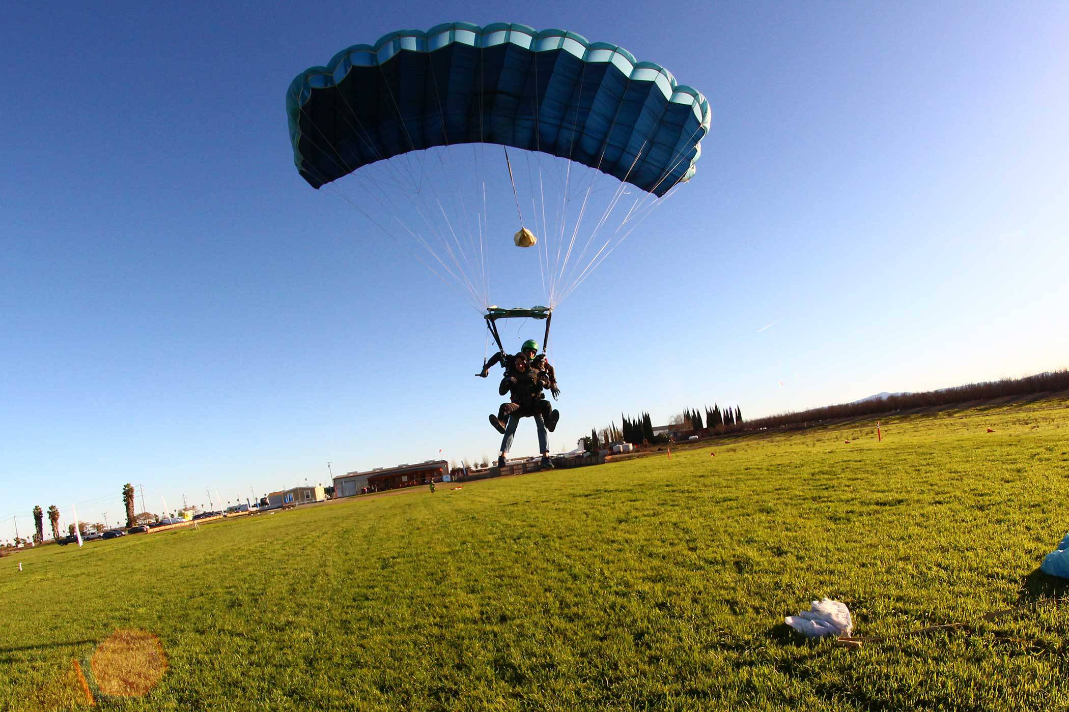 Tandem skydiver coming in for landing after an amazing skydive